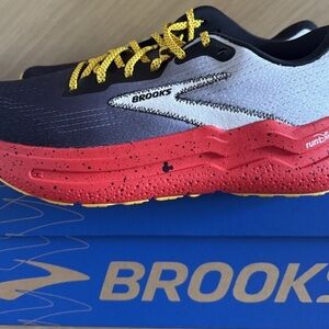 Brooks Black and White Running Shoes with Red Sole
